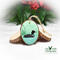 Common loon on a pond hand-painted on a wood slice.  The ornament is available for purchase at Cove Creek Photography.